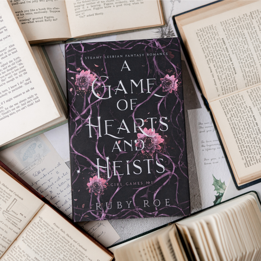 A Game of Hearts and Heists (Girl Games Book 1)